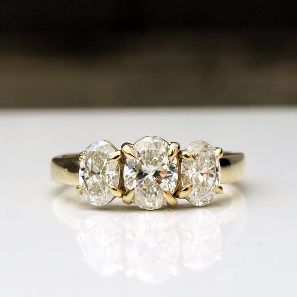 2ct oval diamond trilogy ring