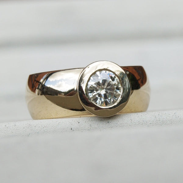 Ethical wide gold ring with moissanite